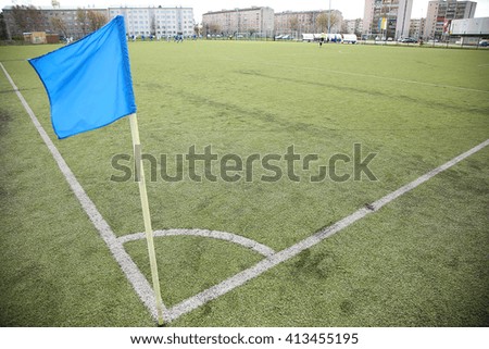 Corner blue flag on an soccer field