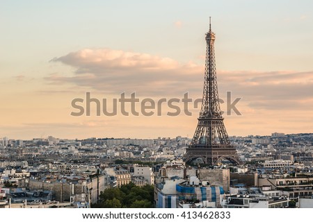 Paris view from the top of Arc de Triomphe de l'Etoile on Sunset. Eiffel Tower on the background. France.
