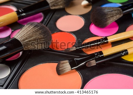 Background picture for wallpaper. Randomly scattered brushes for visage on palettes full of bright and deep colorful gamma. Nice set for being gorgeous.
