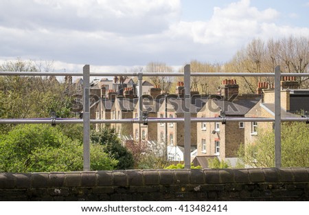 European urban city view behind the fence in West London, United Kingdom