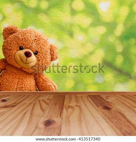 Teddy bear with wooden floor and blurred background