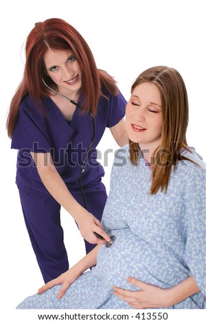 Beautiful Nurse Examines Expecting Mother.