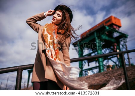 fasion portrait beauty girl on industrial background Royalty-Free Stock Photo #413572831