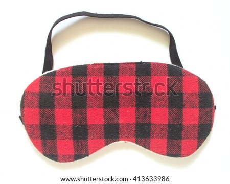 red sleeping mask on the white background