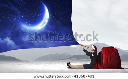 Woman Santa sitting on floor
