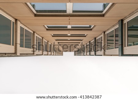 Urban Geometry, looking up to glass building. Modern architecture, glass and steel. Abstract architectural design. Inspirational, artistic image. Industrial design. Modern building.