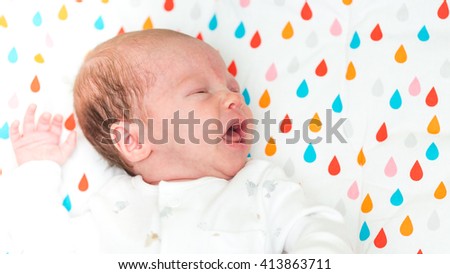 Newborn colicky baby screaming in pain 