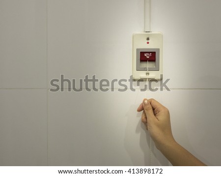 Image of Hand pulling Nurse Call Switch in hospital
