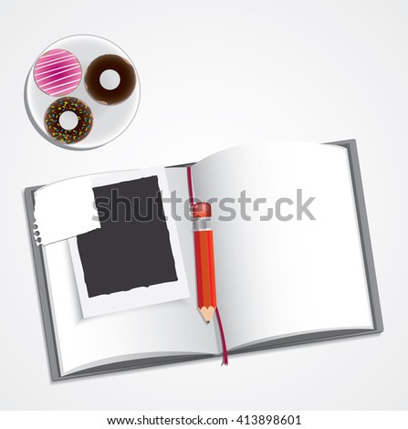 book, pencil,  donut and instant photo with pieces of paper