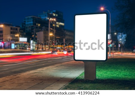 Mock up of vertical street billboard at night