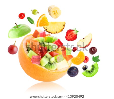 Fresh fruit. Fruit salad on white background  Royalty-Free Stock Photo #413920492