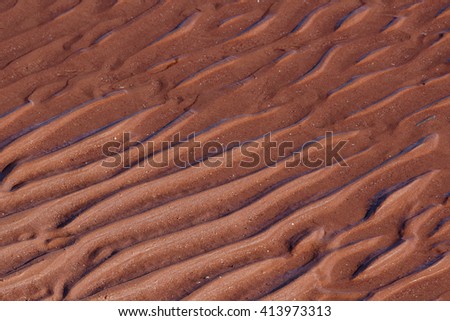 Red sands at low tide