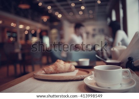 Breakfast tea in a cafe Royalty-Free Stock Photo #413998549