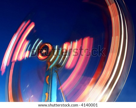  a ride at the fair with a long exposure at night