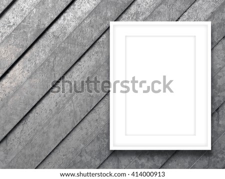 Close-up of one blank picture frame on grey metal shutter background
