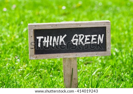 Sign on a green lawn - Think green