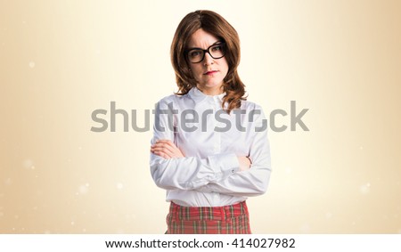Teen student girl with her arms crossed