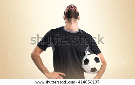Football player looking up