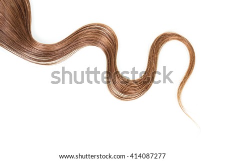 A strand of long, frizzy, brown hair isolated on white background. Royalty-Free Stock Photo #414087277