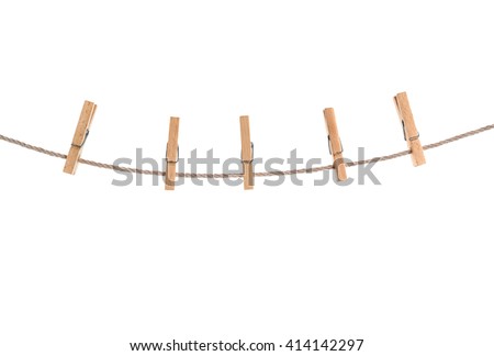 clothespins on rope isolated Royalty-Free Stock Photo #414142297