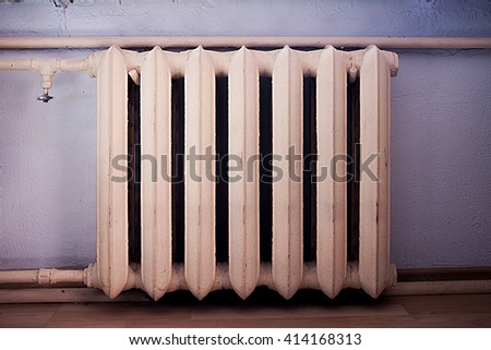 Cast iron radiator vintage full size Royalty-Free Stock Photo #414168313