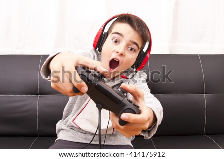 child playing with game console