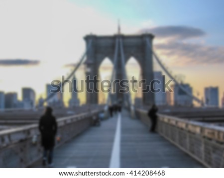 Defocused background with Brooklyn at sunset in New York, United States. Intentionally blurred post production for bokeh effect.