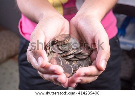Close up of hands stacking coins on white background, Money growing concept, Save money with stack money coin for growing your business
