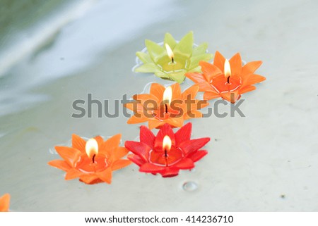 Colorful of floating candles