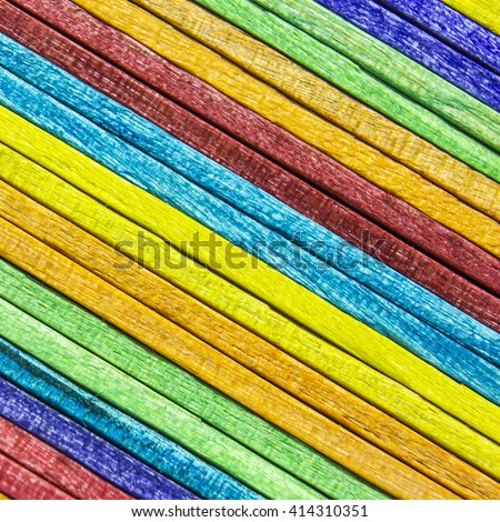 Colorful wooden background, Wooden Popsicle Sticks, Ice Cream Sticks background.