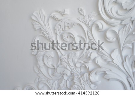 White wall molding with geometric shape and vanishing point. Horizontal. Luxury white wall design bas-relief with stucco mouldings roccoco element