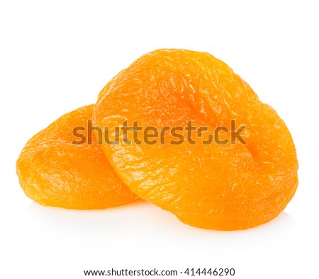 Dried apricots close-up on a white background. Royalty-Free Stock Photo #414446290