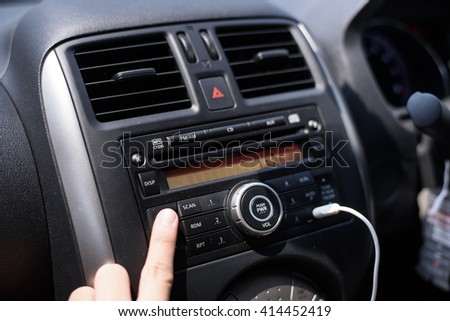 man hand use the switch car interior detail.