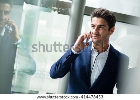 Business man talk to cellphone