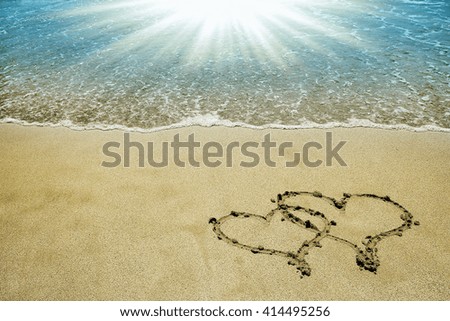 the inscription on the sand seashore