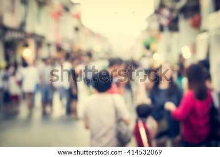 Blurred people walking on the street of phuket old town for background