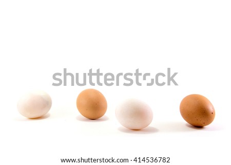 four eggs isolated on white background Royalty-Free Stock Photo #414536782