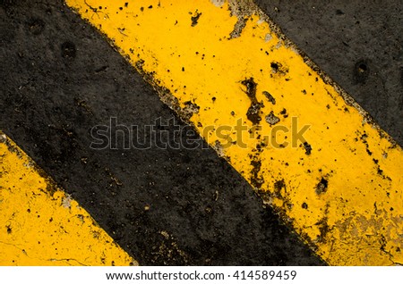 Traffic sign black and yellow color texture background.