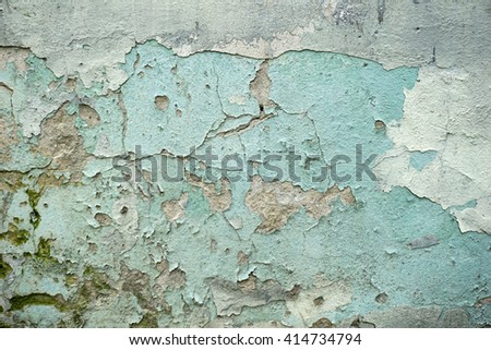 The old shabby brick wall with plaster
