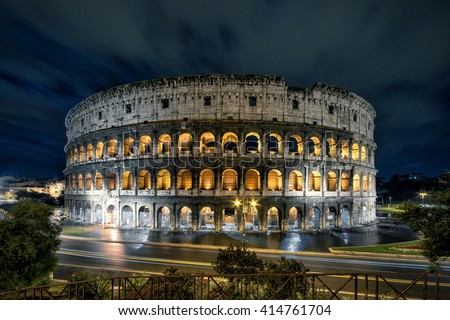 Colosseum or Coliseum at night, Rome, Italy. Colosseum is top tourist attraction of Rome. Scenery of Ancient monument on Piazza del Colosseo at dusk in Rome city center. Night view of Rome landmark. Royalty-Free Stock Photo #414761704