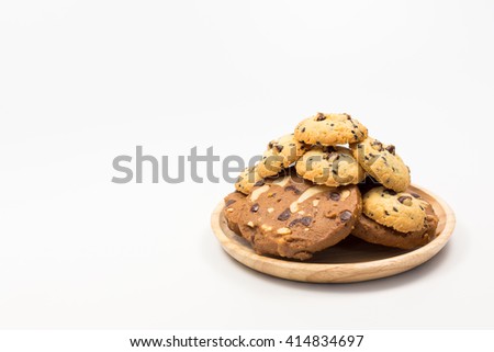 Chocolate chip cookies isolated on white background Royalty-Free Stock Photo #414834697