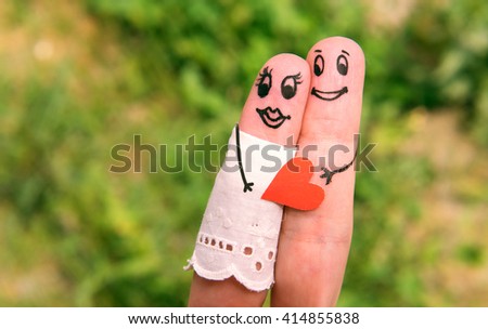 Funny men painted on the fingers. Date. Relationship. Family