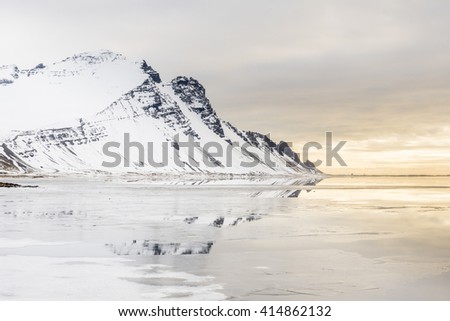 Snowy Stokksnes mountains at the sunset near Hofn, Iceland in winter.