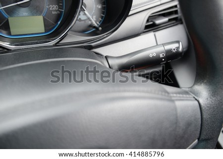 Car interior with light switch