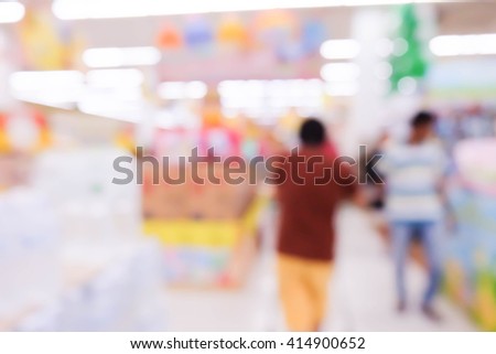 Abstract blurred background of people shopping in mall.