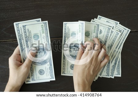 counting money on desk , financial concept , business concept