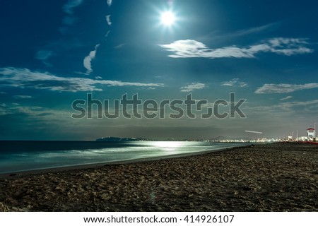 night beach landscape with full moon on Adriatic sea
