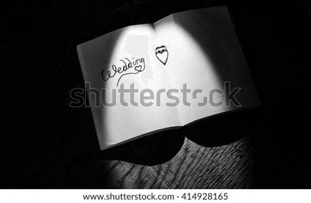 wedding notebook with wedding ring