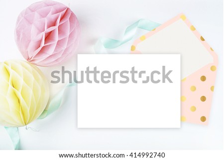 Flat lay. Paper colorful balls. Table view and mock up background. Wedding invitation template. Mock up for your photo or text Place your work
