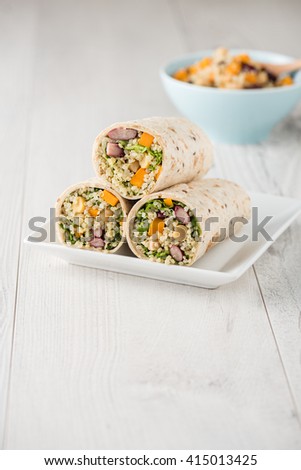 Vegan quinoa wraps with chickpea, kidney beans and pumpkin